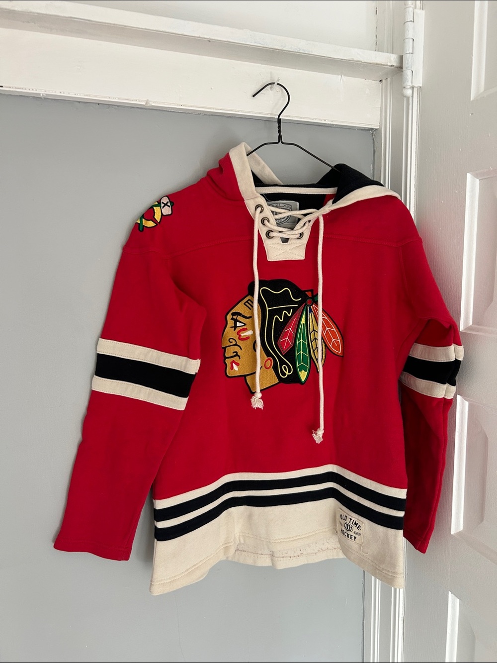 Red Lace-Up Hooded Hockey Pullover with Team Crest